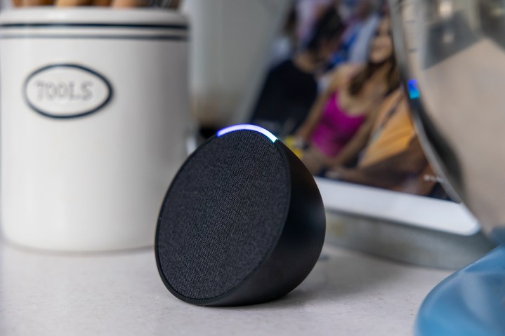 The Amazon Echo Pop on a desk.