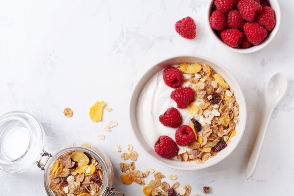 Yogurt with granola and raspberries