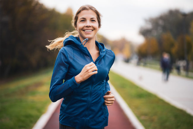 Healthy woman running. 