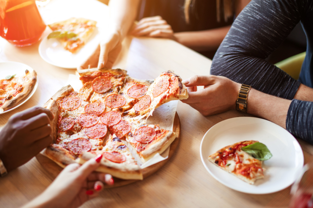 People eating pizza