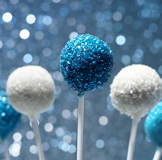 A group of blue and white cake pops

Description automatically generated